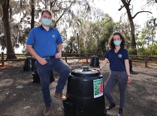 Leon County's Sustainability Team featuring a new Earth Machine Compost Bin - a Sustainability Trivia Night prize.