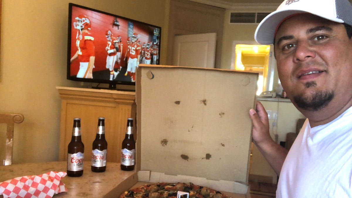 Antonio Delgado ordered in pizza for his Super Bowl party of one in his hotel room in Cabo San Lucas, Mexico. He tested positive for COVID-19 during the trip and had to isolate and delay his return home.