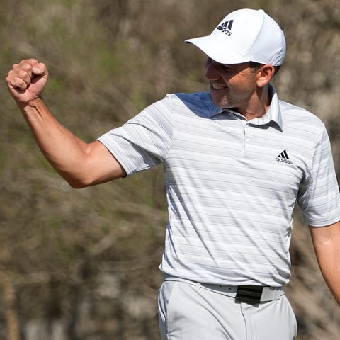 Sergio Garcia celebrates after making a hole in on
