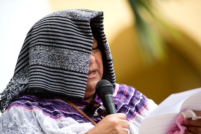 Maria Malin Mendez speaks during a Public Prayer to Honor Farmworkers Lost Due to COVID-19 event at the Saturday March 27, 2021 at the Palm Beach County Health Department in West Palm Beach.