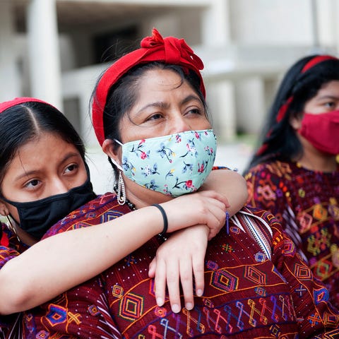 Sindia Vasquez, 13, Juana Lopez and Flor Perez, 14