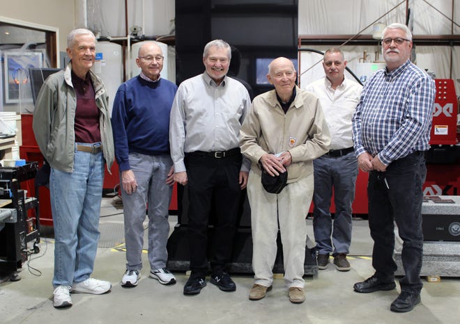 Members of the Fairfield Township Veterans Memorial Committee, from left, George Bryans, Jack Burns, Fred Valerius, Barney Landry, Jim Smith, and Trustee Joe McAbee, were on hand shortly after granite for the memorial was delivered to Laser Imaging and Design.