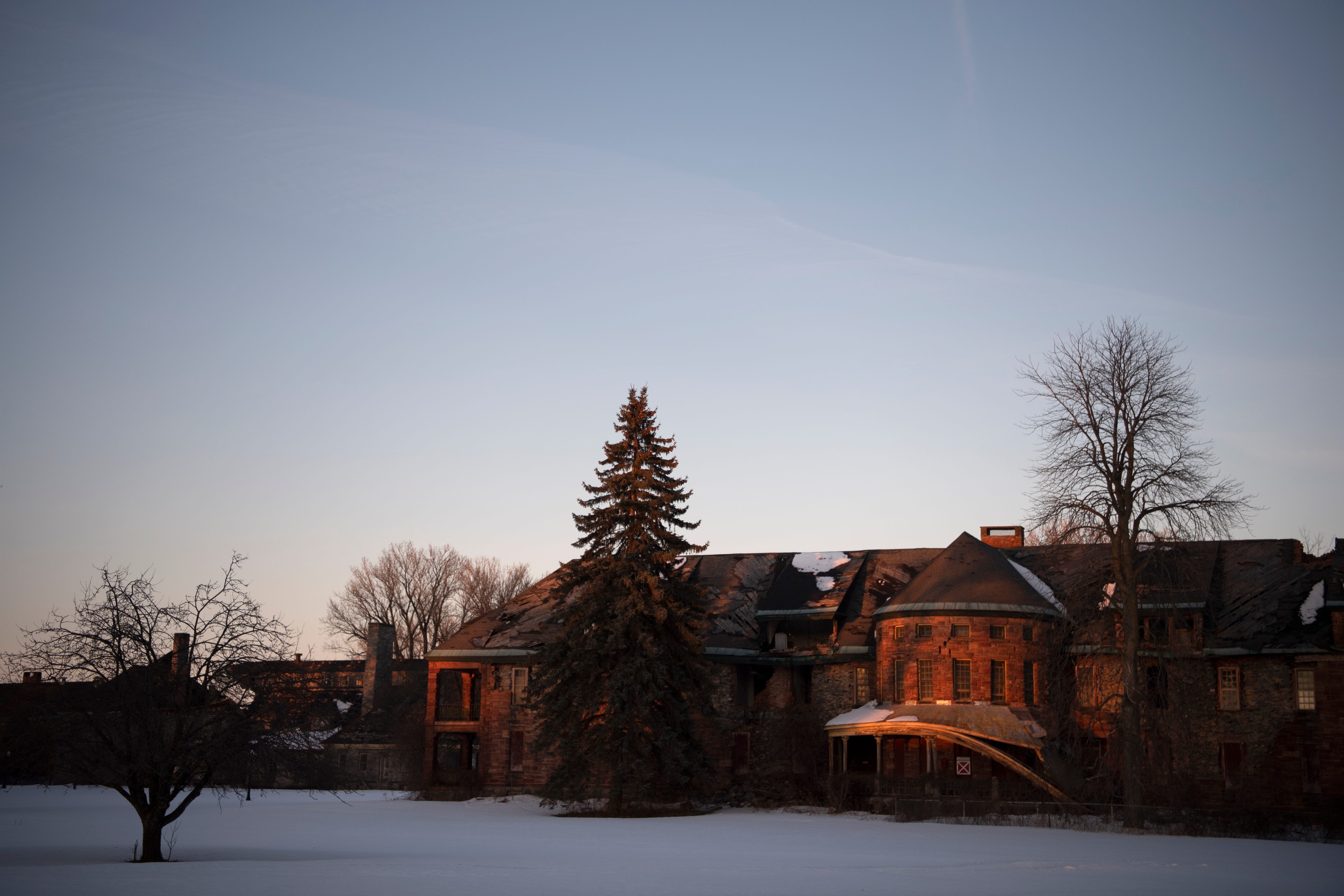 An abandoned building sits on the former campus of the St. Lawrence State Hospital, a long-closed, state-run psychiatric facility in Ogdensburg.