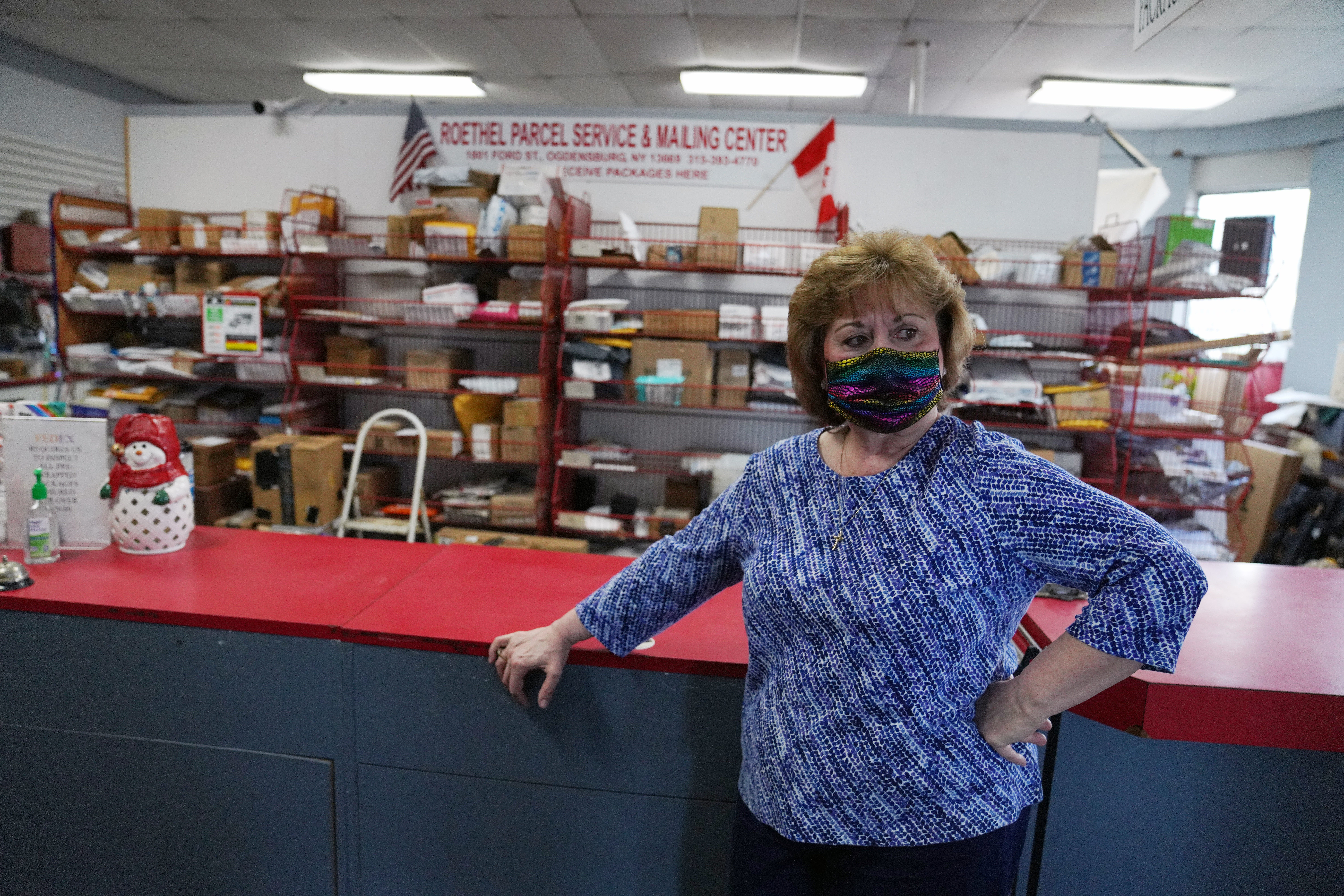Laurel Roethel operates Roethel Mailing Center & Parcel Service in Ogdensburg. Her store is struggling because the border with Canada is closed, leaving her with many packages that have not been picked up by clients who live across the St. Lawrence River in Ontario.