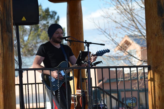 Dallas David Ochoa performs on the gazebo in the Mesilla Plaza Friday afternoon, March 26, 2021 in part of the Experience Mesilla Spring Music Fest 2021.