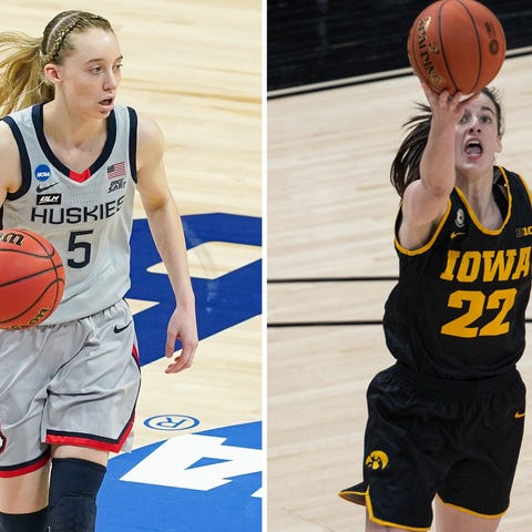 Connecticut guard Paige Bueckers, left, and Iowa g