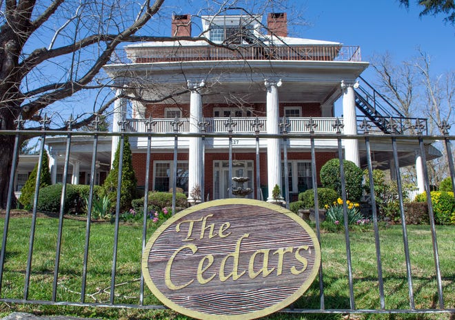 A sign in front of a stately building situated one block west of Church Street on Seventh Avenue West in Hendersonville has been seen by countless visitors since the early 1900s.
