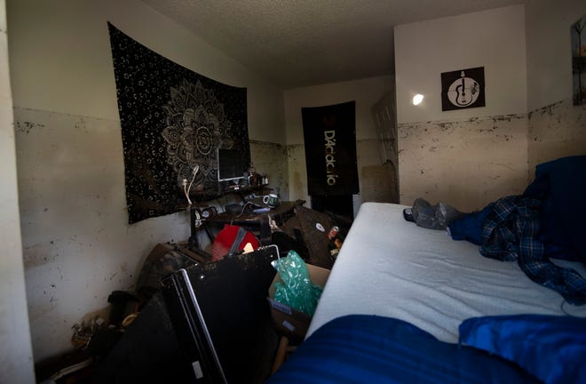 Luc DiGiuseppe’s apartment at City Vue Apartments on Linbar Dr. shows the watermark from flooding Sunday, March 28, 2021 in Nashville, Tenn. His apartment that sits along Mill Creek was flooded the night before damaging his belongings along with his collection of guitars. 