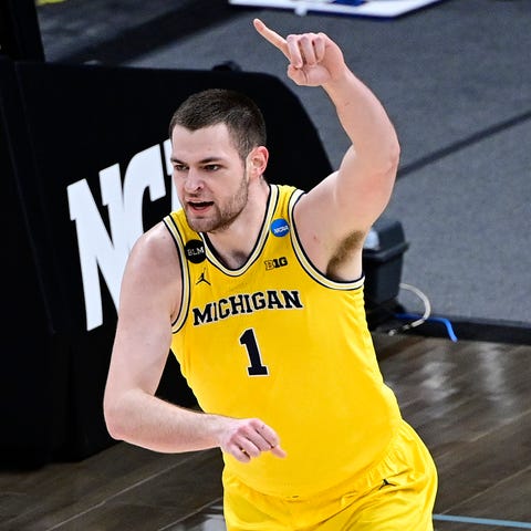 Michigan Wolverines center Hunter Dickinson reacts