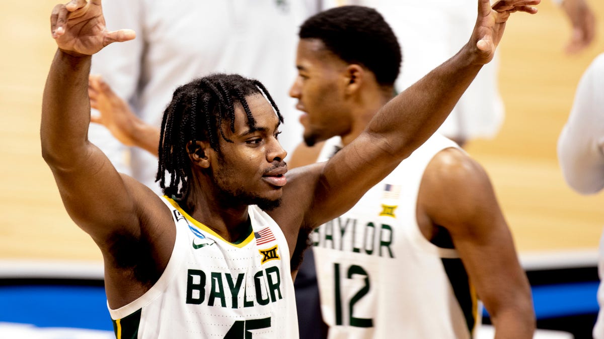 Baylor Bears guard Davion Mitchell (45) celebrates as he leaves the court after defeating Villanova in the Sweet 16 of the men's NCAA Tournament.
