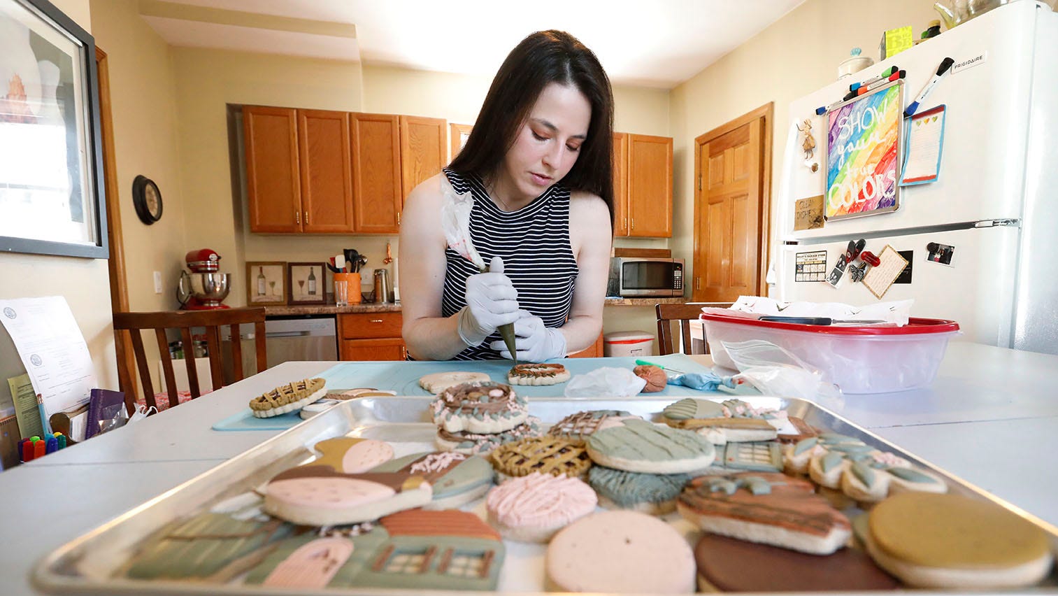 Cookie maker Jessica Brainsky of Plymouth bakes and hand decorates cookies with earthy hues and textures.