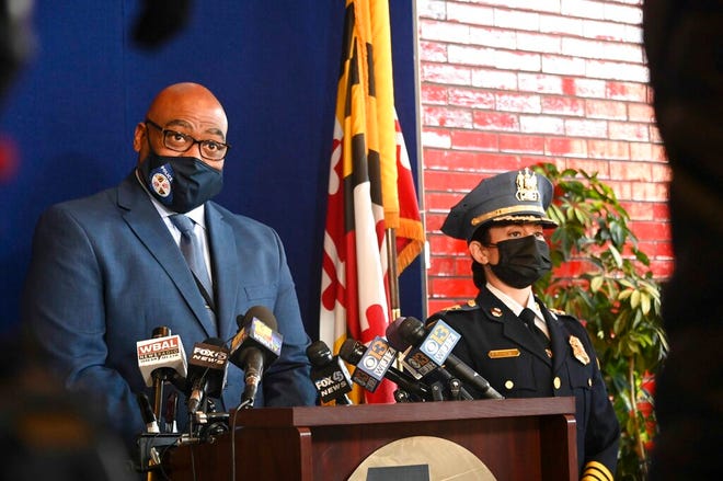 Baltimore County Police Col. Andre Davis, left, and Police Chief Melissa Hyatt are shown at a news conference  in Baltimore County on Monday, March 29, 2021. Investigators have â€œno ideaâ€ why a Maryland man fatally shot his parents at their home and gunned down two other people at a convenience store before setting fire to his apartment and killing himself, a police official said Monday. A gun that Joshua Green, 27, used in Sunday's deadly shooting spree was registered to him and had been legally purchased, according to Baltimore County Police Col. Andre Davis. (Lloyd/The Baltimore Sun via AP)