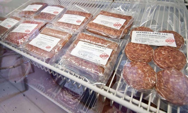 A variety of frozen meats in a freezer labeled with a red "Not for Sale" stamp.