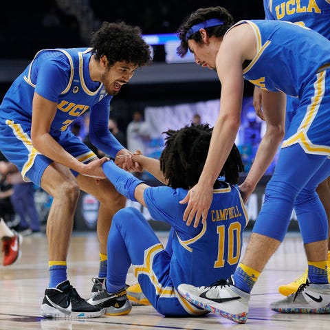 Tyger Campbell of the UCLA Bruins celebrates with 