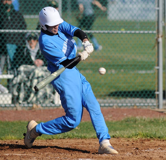 Alliance's Curtis Taylor swings at a pitch in a game against GlenOak in March 2021.