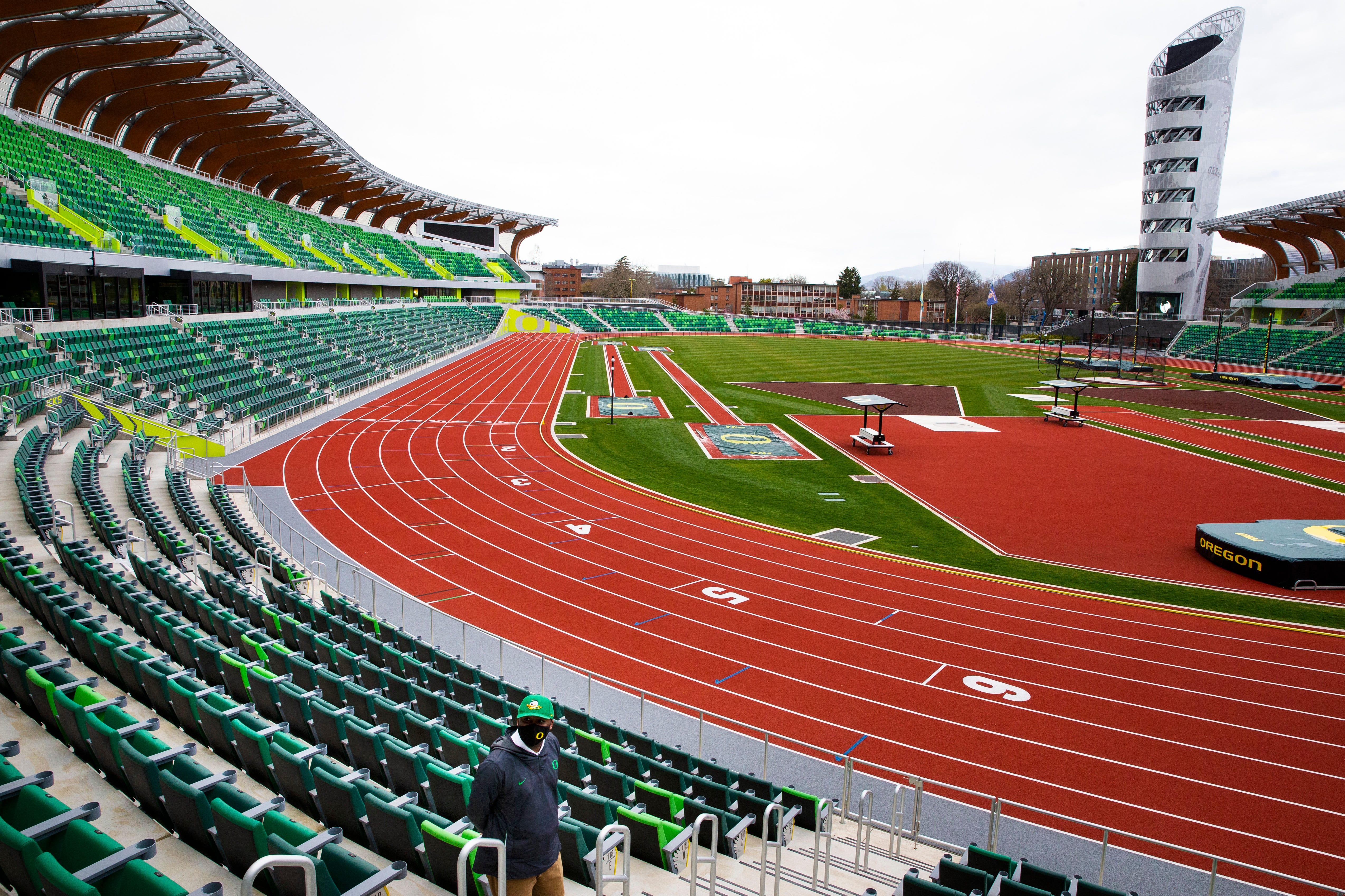 University of Oregon Athletic's Zach Lawson leads a tour of Hayward Field for media in preparation for the first meet in the new track and field venue  in Eugene, Oregon, on March 29, 2021.