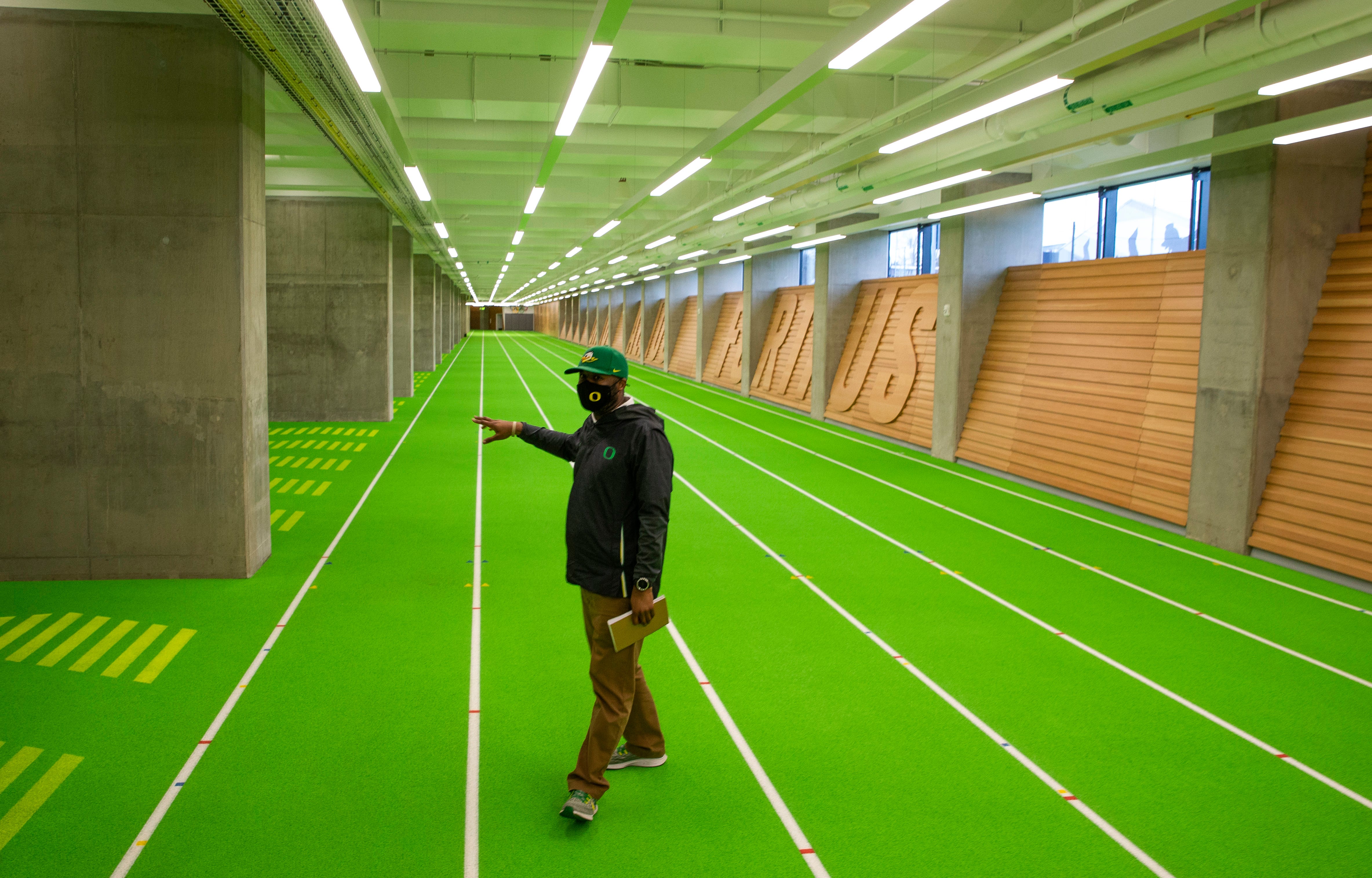 Oregon Athletics'  Zach Lawson describes the warmup area under the stands on the west side of the Hayward Field complex at the University of Oregon in Eugene, Oregon, on March 29, 2021.