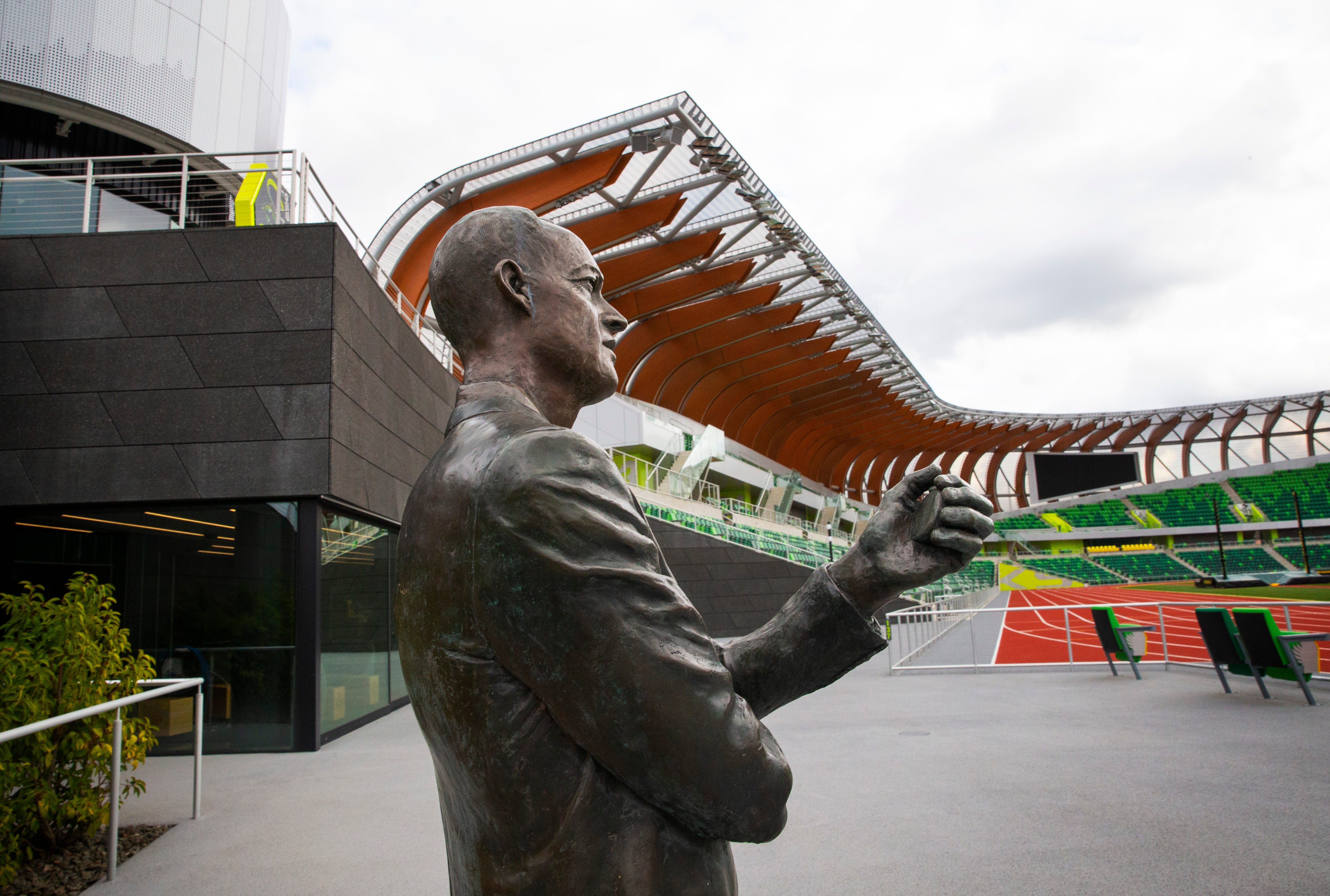 A statue of Bill Bowerman that stood just outside turn four in the historic Hayward Field venue now keeps an eye on turn three near the northeast entrance to the venue in Eugene, Oregon, on March 29, 2021.