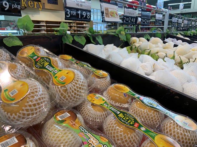 Consider these fruits for your party table 4 A variety of pears at Asian Food Market in Marlboro.