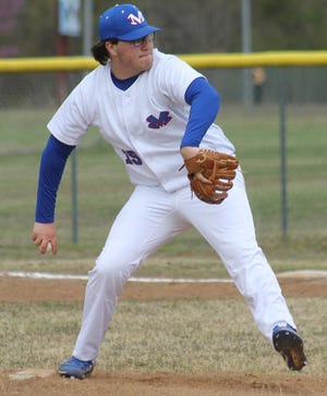 Mountainburg pitcher Ryan Steinsiek warms up during Tuesday's nonconference game against Mulberry at home.