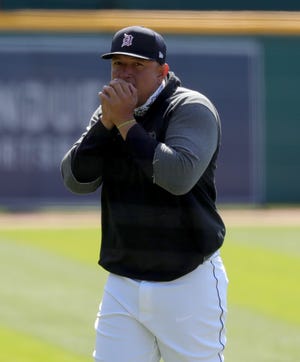 Tigers first baseman Miguel Cabrera keeps his hands warm during practice on Wednesday, March 31, 2021, at Comerica Park, a day before Opening Day against the Cleveland Indians.