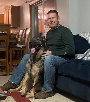 Deputy Sam Staley with Viking, a now retired K-9 from the Marion County Sheriff's Office. Staley, who started as a K-9 handler in January 2020, said Viking was his first K-9 he worked with. Staley is now the owner of Viking after purchasing her back from the Sheriff's Office after her retirement.
