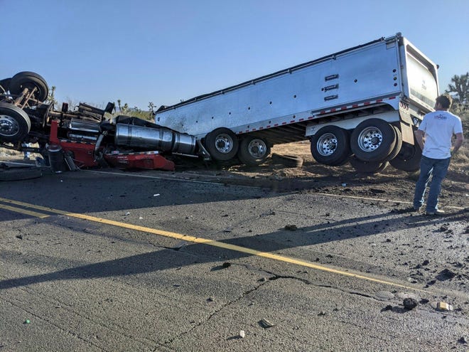 A portion of U.S. 93 near Wickenburg is closed March 31, 2021, following a two-vehicle crash involving a tractor trailer carrying rocks and a passenger vehicle.