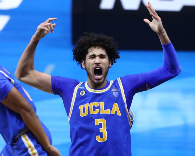 Johnny Juzang and the UCLA Bruins are big favorites to win the Pac-12 men's basketball title this season.