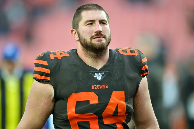 In this Dec. 8, 2019, file photo, Cleveland Browns center JC Tretter walks off the field after an NFL football game against the Cincinnati Bengals in Cleveland.