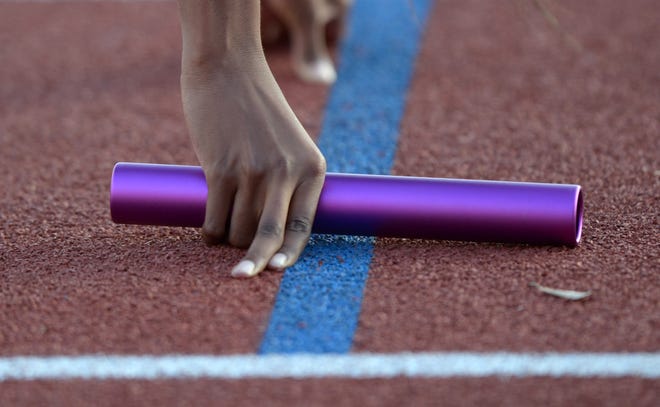 Mar 28, 2014; Austin, TX, USA; General view of a baton held by Kiersten Duncan of LSU in the starting blocks of the womens sprint medley relay in the 87th Clyde Littlefield Texas Relays at Mike A. Myers Stadium. Mandatory Credit: Kirby Lee-USA TODAY Sports