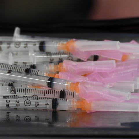 Syringes with the COVID-19 vaccine on  March 31, 2