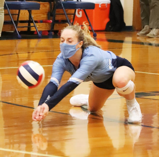 Prairie Central's Natalie Graf hits the floor to dig up an attack from Tolono (Unity) during Thursday's volleyball match in Fairbury. The visitors won in two sets.