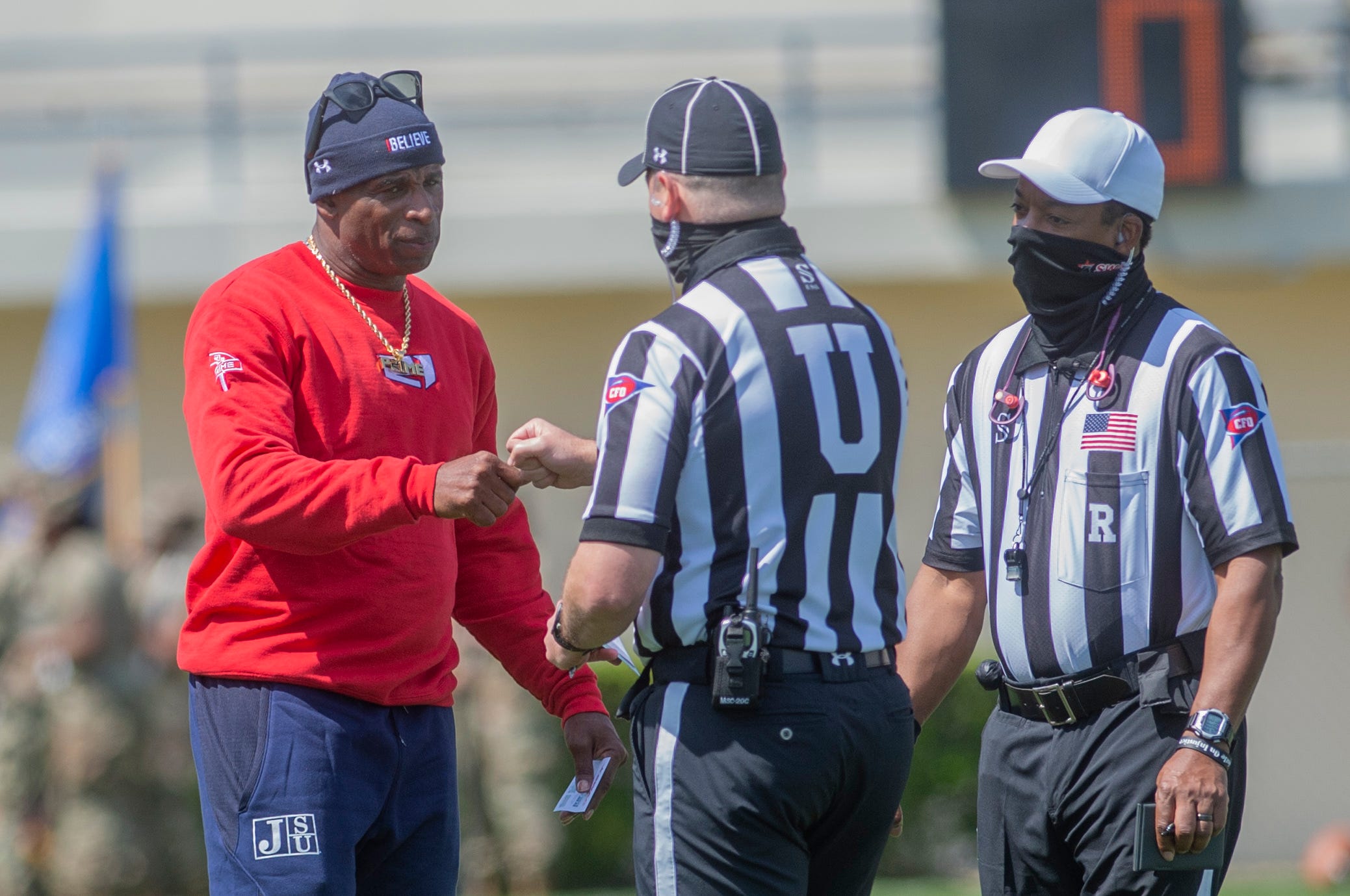 Coach Deion Sanders spoke with the officials during pregame warm-ups before Jackson State's April 3 home game against Southern.