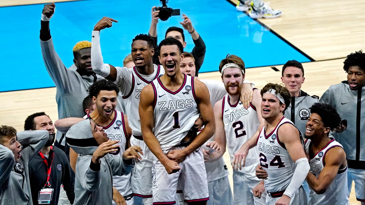 Final Four: Gonzaga guard Jalen Suggs celebrates with teammates after hitting a buzzer-beating 3-pointer in overtime that lifted the Bulldogs past No. 11 UCLA and into the men's national championship game.