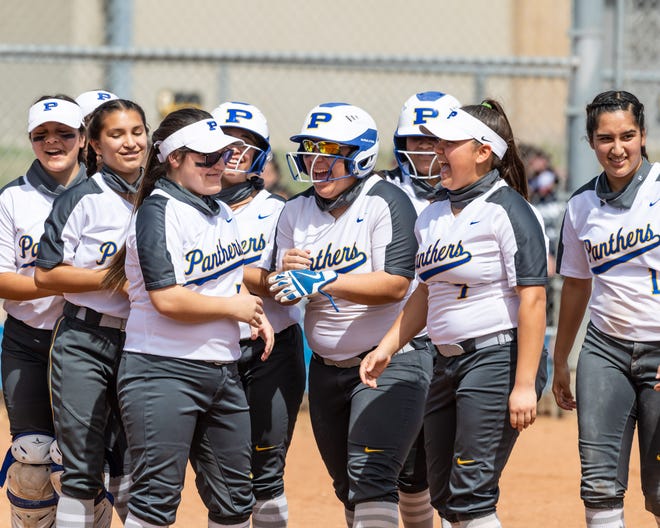 Catcher Elia Palomo, center, celebrates with her teammates after hitting a home run for Pflugerville against Hendrickson last month. The Panthers can tighten their grip on first place in District 18-5A with a win over Elgin this Tuesday.