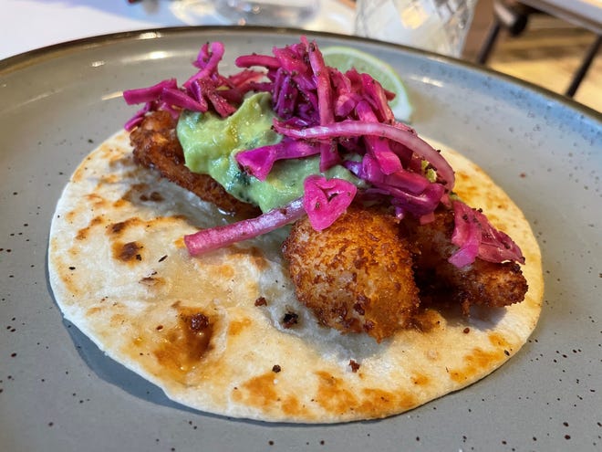 Babalu's tacos can come with guacamole and shredded red cabbage.