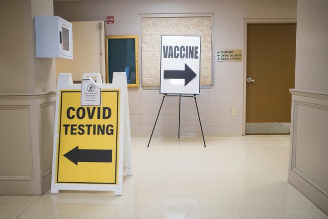 Signs point to separate COVID-19 testing and COVID-19 vaccination events Thursday, April 1, 2021, at the Modern Maturity Center in Dover. 