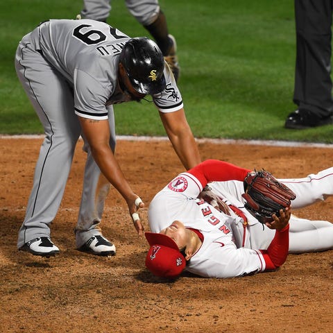 Chicago White Sox first baseman Jose Abreu checks 
