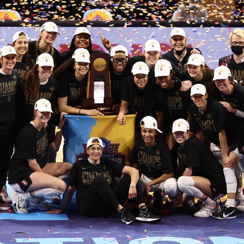 Stanford players celebrate after winning the 2021 