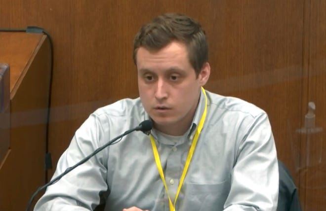 In this image from video, witness Dr. Bradford Wankhede Langenfeld, the doctor who pronounced George Floyd dead, testifies as Hennepin County Judge Peter Cahill presides Monday, April 5, 2021.