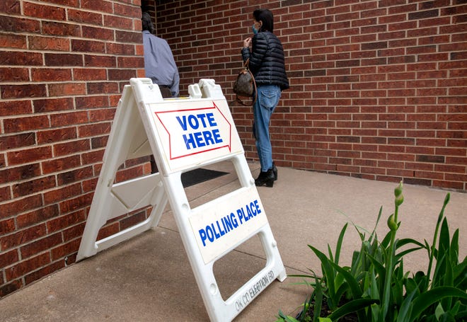 Voters arrive to cast their ballots April 6, 2021, at Stonegate Cumberland Presbyterian Church in Edmond.
