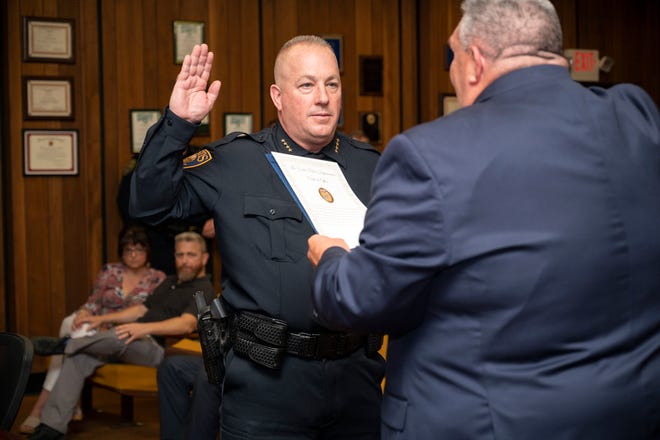 Eustis Mayor Michael Holland swears in the new Chief of Police, Craig A. Capri on Monday, April 5, 2021. [Cindy Peterson/Correspondent]