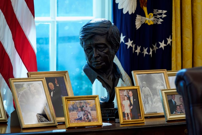 A sculpture of Latino American civil rights and labor leader Cesar Chavez is displayed in the Oval Office of the White House, Thursday, Jan. 28, 2021, in Washington. (AP Photo/Evan Vucci)