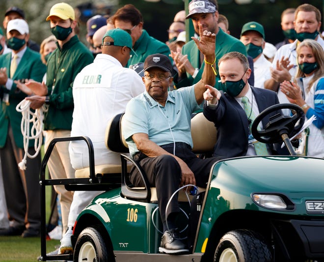 Lee Elder acknowledges the crowd as he leaves the no. 1 tee during Thursday's first round for the Masters at Augusta National Golf Club, Thursday, April 8, 2021, in Augusta, Georgia.