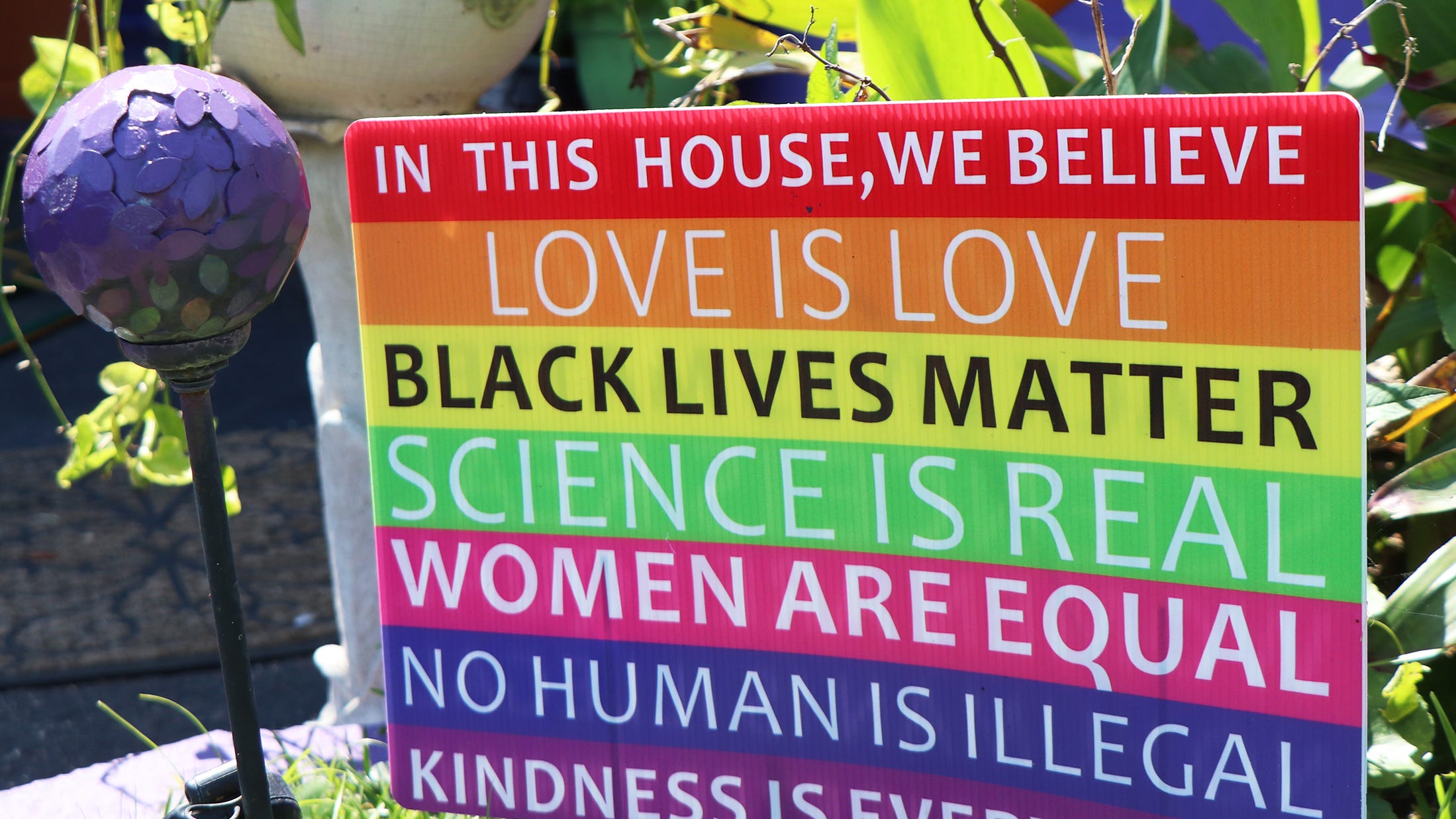 LGBTQ, BLM banners wave in war with Confederate flag on Florida street