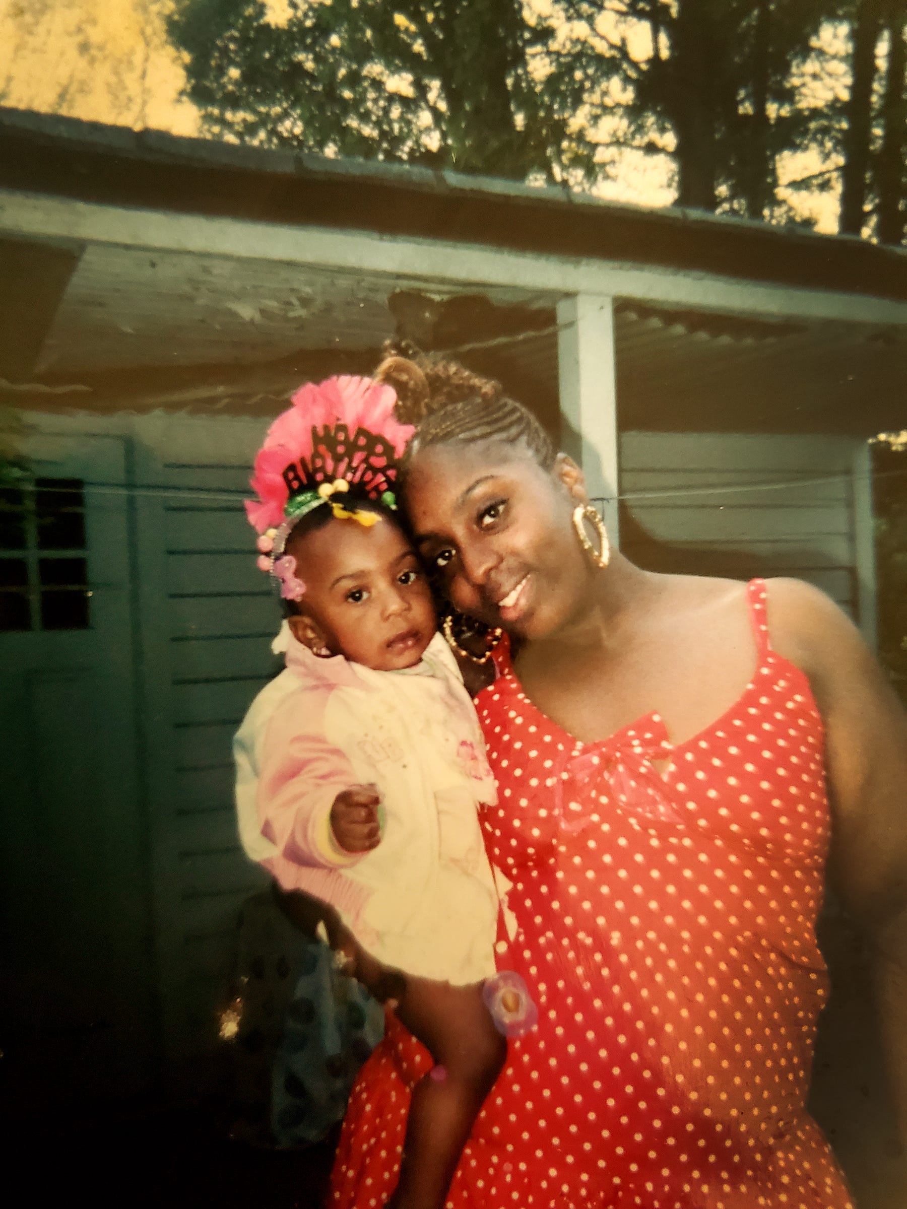 Tyra Moore, pictured with her daughter Samari Malone at her first birthday party in 2008.