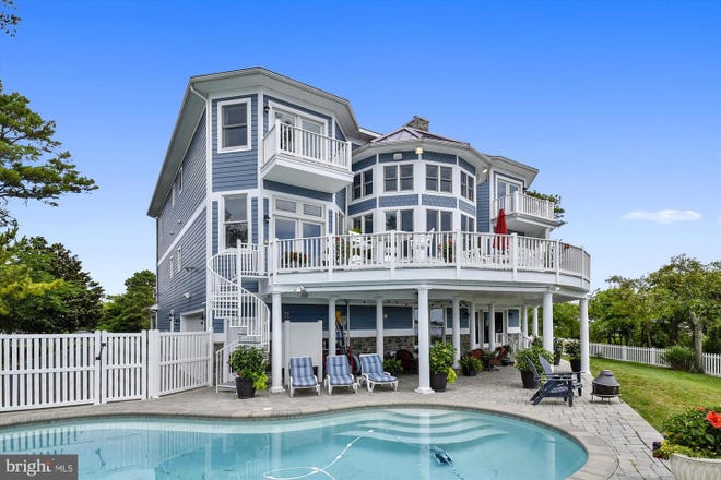 At 12547 Ocean Reef, Berlin, Maryland this 7,500-plus square feet of "luxury coast oasis" is listed with Keller Williams Reality.
