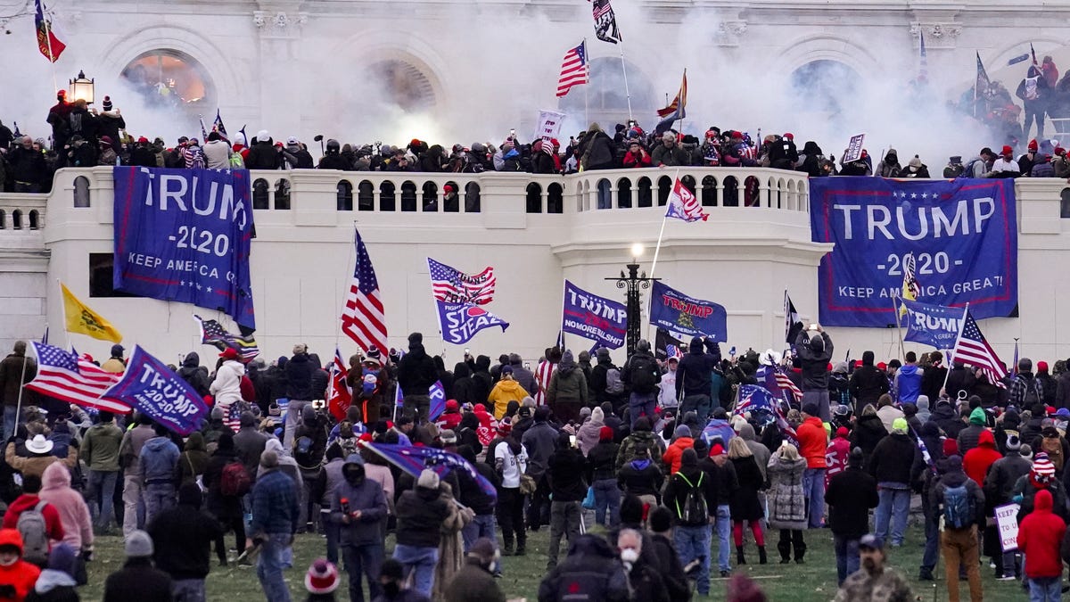 Rioters supporting President Donald Trump storm the Capitol in Washington on Jan. 6, 2021.