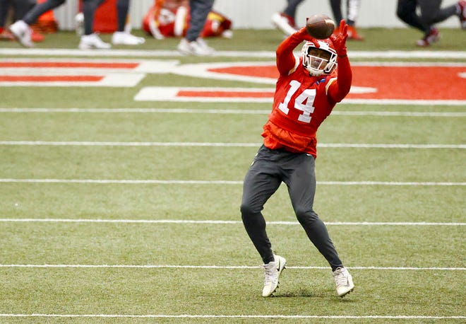 Former Kansas City Chiefs wide receiver Sammy Watkins, seen here catching balls during practice on Feb. 4 ahead of Super Bowl LV, is now a member of the Baltimore Ravens.