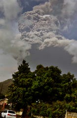 Plumes of ash rise from the La Soufriere volcano on the eastern Caribbean island of St. Vincent on Friday.